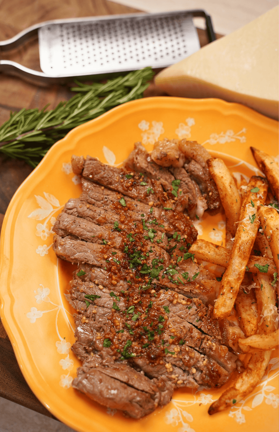 TUSCAN STEAK WITH ROSEMARY BUTTER & PARMESAN FRIES